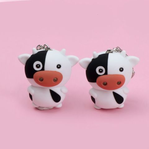 Móc Khóa Phát Sáng LED Có Nhạc Hình Bò Sữa Đáng Yêu - Móc Khóa Đèn Pin 3 in 1 Thú Vị Cho Fan Cá Tính