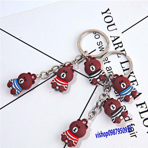 Móc Khóa Gấu Nâu Buồn Ngồi Mặc Áo Sọc - Phụ Kiện Thời Trang Dễ Thương, Quà Tặng Độc Đáo Cho Fan Gấu Brown