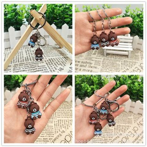 Móc Khóa Gấu Nâu Buồn Ngồi Mặc Áo Sọc - Phụ Kiện Thời Trang Dễ Thương, Quà Tặng Độc Đáo Cho Fan Gấu Brown