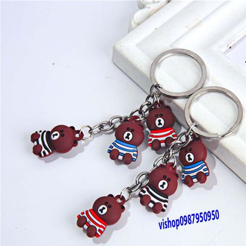 Móc Khóa Gấu Nâu Buồn Ngồi Mặc Áo Sọc - Phụ Kiện Thời Trang Dễ Thương, Quà Tặng Độc Đáo Cho Fan Gấu Brown