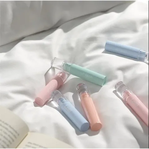 Son Kem Bóng Ofélia Lolli Glow Tint - Son Dưỡng Ẩm Bóng Mướt, Hiệu Ứng Lấp Lánh, Mùi Trà Đào, Nhiều Màu Sắc Cho Môi Quyến Rũ