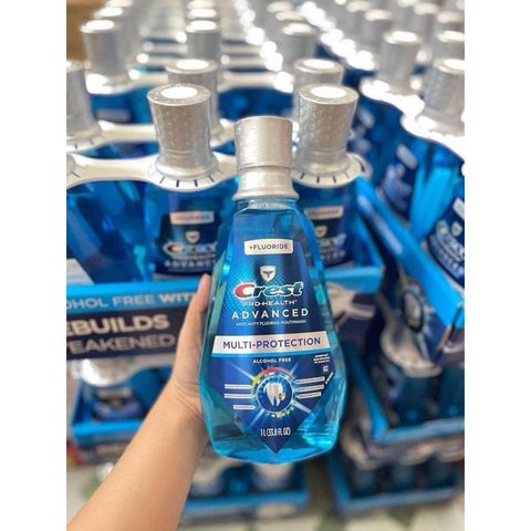 Nước Súc Miệng CREST Pro-Health Advanced 1L - Chống Sâu Răng, Làm Sạch Nướu, Hơi Thở Thơm Mát, Phục Hồi Men Răng