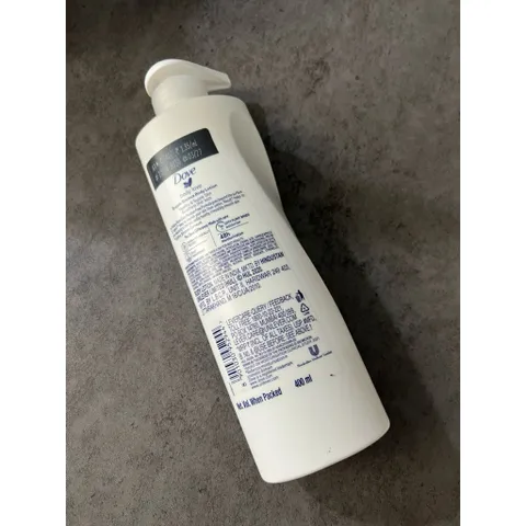 Dưỡng thể Dove Body Lotion Nourished Radiance 400ml hàng Úc