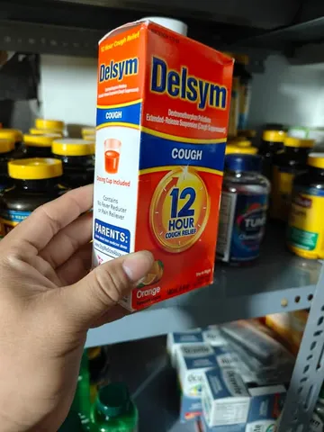 Siro ho Delsym 12 Hour Cough Relief Day or Night 148ml cho người lớn và trẻ em 4+ (vị Cam)