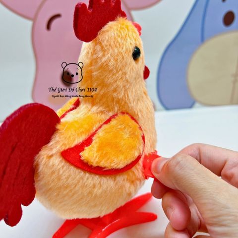 Đồ chơi gà bông vặn dây cót nhảy lon ton giúp bé làm quen với động vật