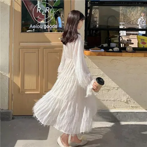 Đầm trắng bông tuyết thắt nơ
