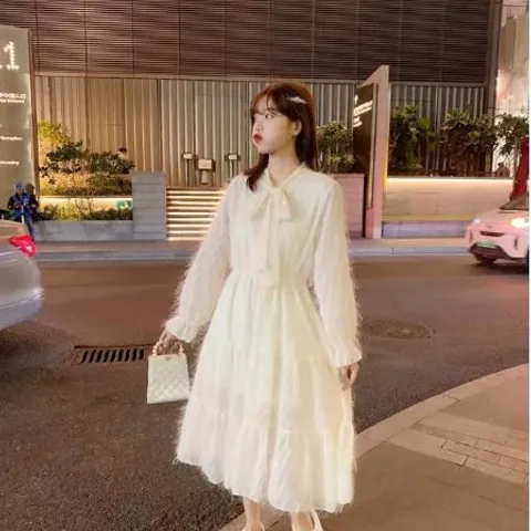Đầm trắng bông tuyết thắt nơ
