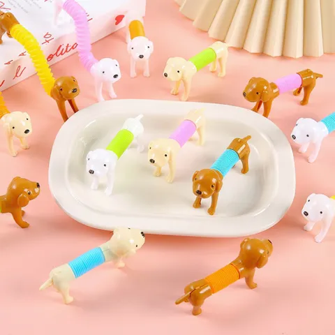 Đồ chơi nhựa chó kéo dài bụng