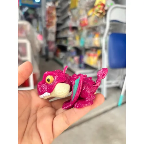 Đồ chơi nhựa (blind bag) khủng long cắn tay vui nhộn