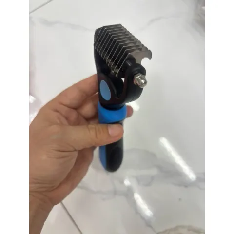 Lược gỡ rối lông cho chó mèo và thứ lớn