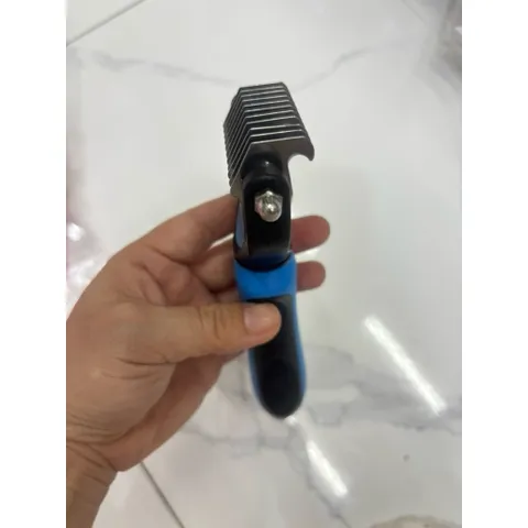 Lược gỡ rối lông cho chó mèo và thứ lớn
