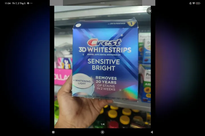 Miếng dán kèm máy chiếu làm trắng răng Crest 3D Whitestrips Sensitive Bright 28 miếng + 1 LED Light 727875