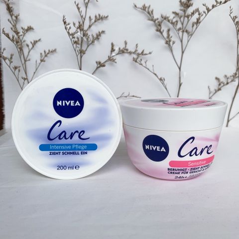 Kem dưỡng ẩm NIVEA CARE cung cấp vitamin E và vitamin A dưỡng ẩm cho da mặt và toàn thân 200ml