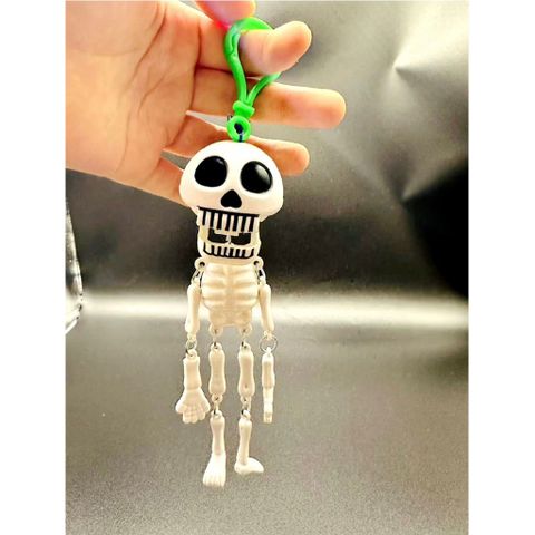 Đồ chơi nhựa có dây thiều Móc khoá bộ xương nhựa trắng