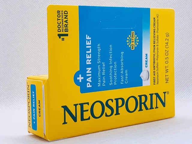 Tuýt kem bôi kháng viêm, liền sẹo Neosporin Dual Action Cream 14.2g