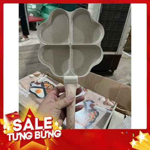 Chảo chống dính 4 ngăn khoanh trái tim màu trắng dùng được bếp từ
