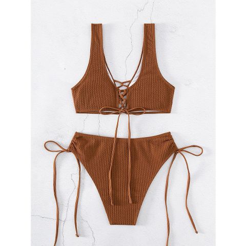 Sét bikini 2 mảnh quây cúp ngực khoen tròn màu trơn khoét eo đi biển sexy