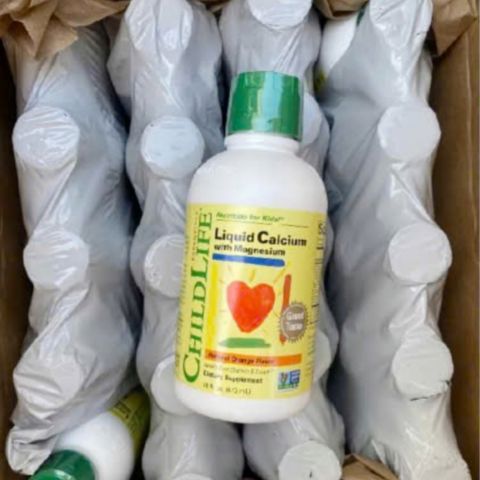ChildLife Liquid Calcium with Magnesium dạng nước vị Cam cho trẻ 6 tháng - 12 tuổi |473 mL| Xây dựng hệ xương vững chắc & Phòng ngừa còi xương hiệu quả [S/P Chuẩn Mỹ]