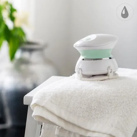 Máy massage cầm tay mini Medisana HM 300