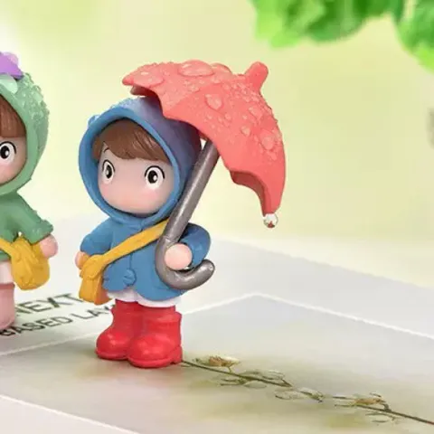 Cô gái nhỏ cầm ô cute - trang trí tiểu cảnh,taplo ô tô,bàn học…
