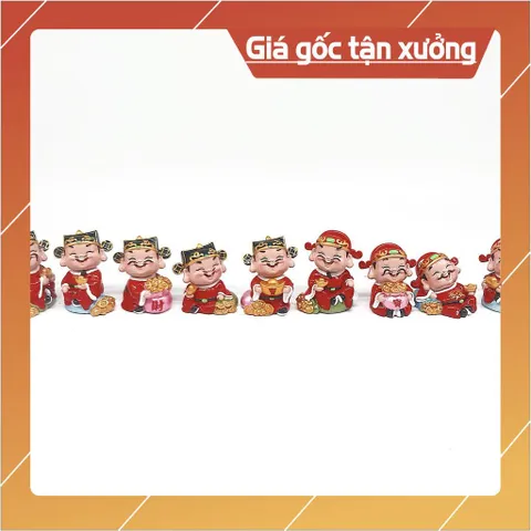 Tượng thần tài áo đỏ cùng ngân lượng phong thủy phát tài