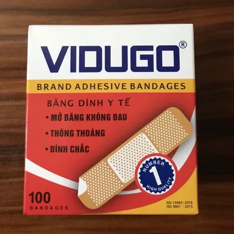 Băng keo cá nhân Vidugo đỏ (Hộp 100 miếng) Dính chắc, mở băng không đau, dễ sử dụng, khô thoáng.