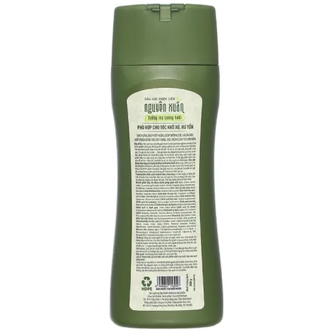 Dầu gội dược liệu Nguyên Xuân hương Bưởi (Chai 250ml) giúp dưỡng tóc mềm mượt, giảm gãy rụng và nuôi dưỡng da đầu.