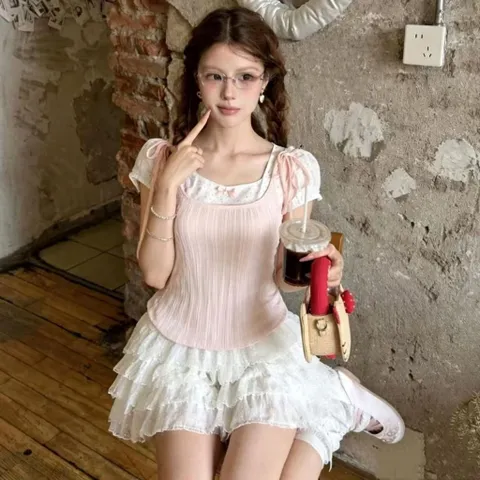 Áo kiểu nữ thun gân màu hồng phối nơ tiểu thư và hoa nhí ngọt ngào