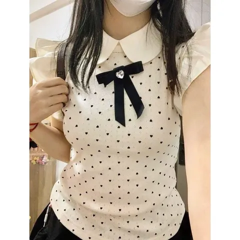 Set bộ áo chấm bi dệt kim tay bèo cổ bẻ tiểu thư và chân váy tầng bèo đen