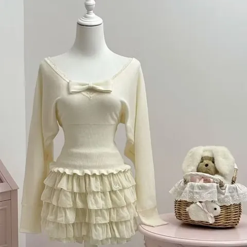 Áo len đính nơ cổ chữ V phối ren viền bèo ôm hông tiểu thư