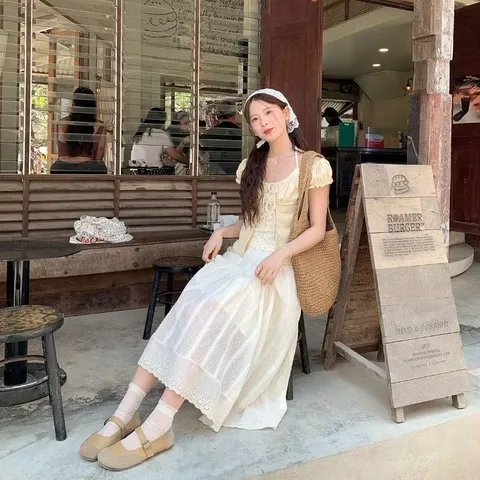 Áo thun babydoll tay ngắn bo chun phối áo dây hoa nhí và nơ ngực xinh xắn phong cách Hàn Quốc