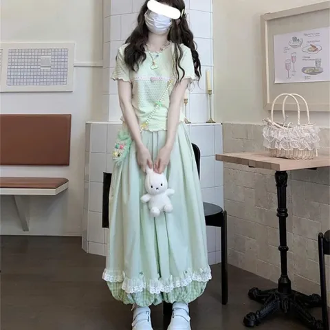 Quần bí dáng rộng kẻ caro phối bèo ren và hình quả dứa dễ thương
