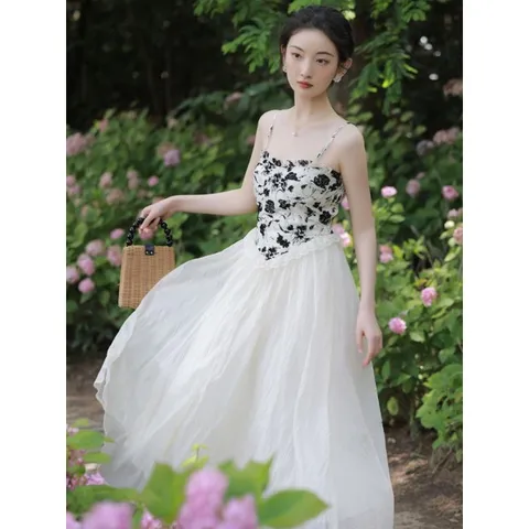 Váy hai dây đen da báo kiểu corset voan trắng