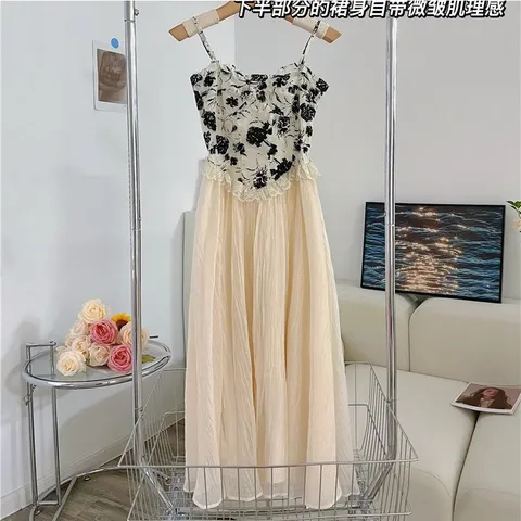 Váy hai dây đen da báo kiểu corset voan trắng
