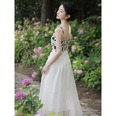 Váy hai dây đen da báo kiểu corset voan trắng