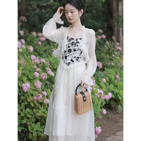 Váy hai dây đen da báo kiểu corset voan trắng