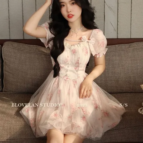 Váy xòe cuộn voan lưới hoa đính nơ và cúc ngọc (sẵn XS, M,L)