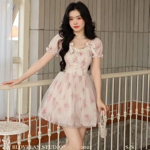 Váy xòe cuộn voan lưới hoa đính nơ và cúc ngọc (sẵn XS, M,L)