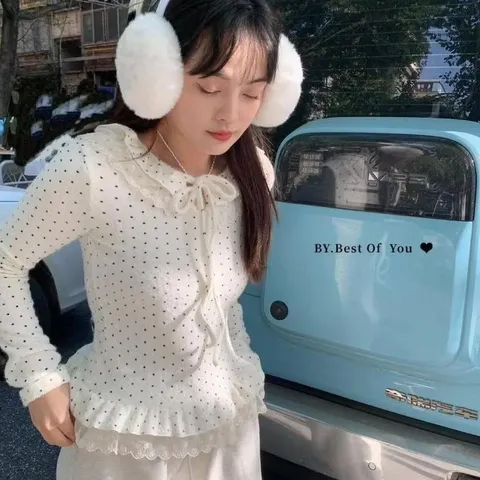 Áo mặc trong lông thỏ giữ nhiệt chấm bi lượn bèo thắt nơ. Áo mặc trong chấm bi đen trắng kem phối với áo khoác ngoài