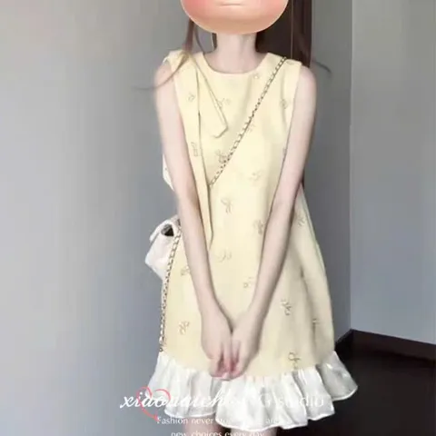 Váy suông tiểu thư dáng suông đính nơ vai xinh xắn màu vàng pastel, phong cách nhẹ nhàng thanh lịch Hàn Quốc