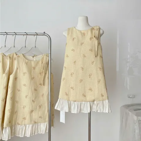 Váy suông tiểu thư dáng suông đính nơ vai xinh xắn màu vàng pastel, phong cách nhẹ nhàng thanh lịch Hàn Quốc