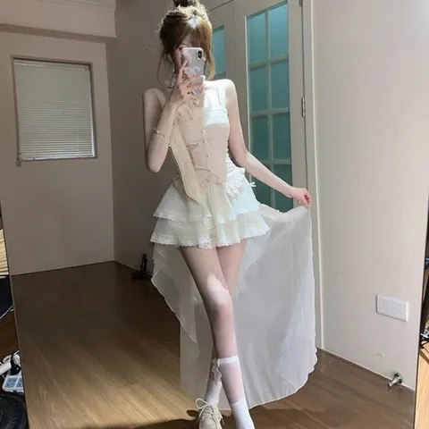 Áo hai dây hồng bèo đính nơ hoa ngọt ngào