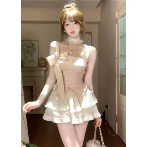 Áo hai dây hồng bèo đính nơ hoa ngọt ngào