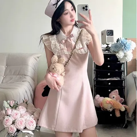 Đầm dạ hồng phấn tay bèo cổ yếm tiểu thư đính nơ