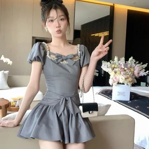Set váy xòe nơ phối dây đính đá trễ vai tiểu thư (sẵn kem)