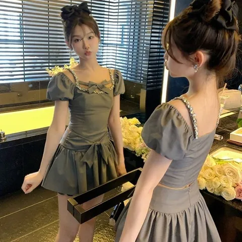 Set váy xòe nơ phối dây đính đá trễ vai tiểu thư (sẵn kem)