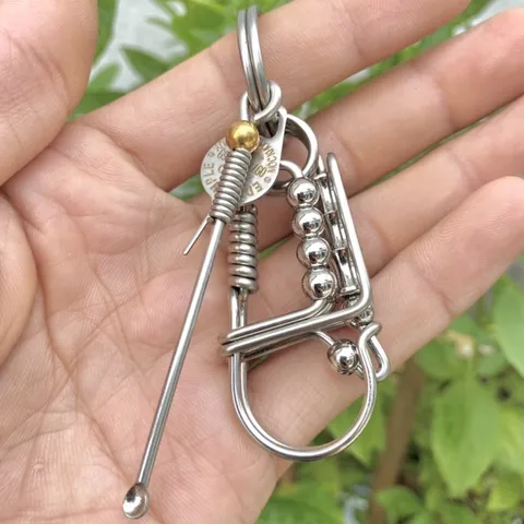 Móc khoá inox 304 làm thủ công bằng que hàn 2 ly phối trụ đốt tre và bi càng dùng càng sáng bóng