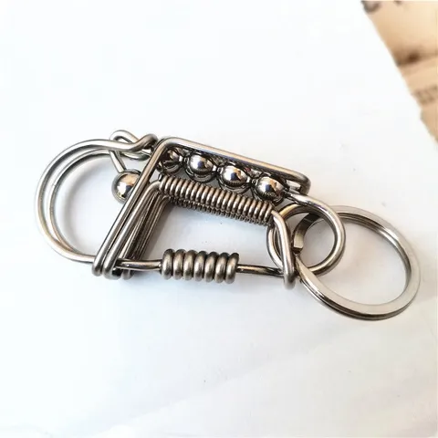 Móc khoá inox 304 làm thủ công bằng que hàn 2 ly phối trụ đốt tre và bi càng dùng càng sáng bóng