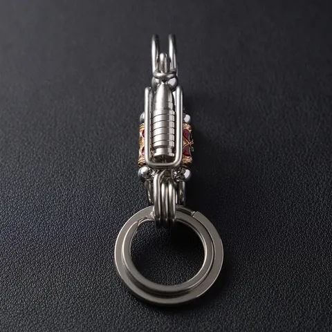 Móc khoá inox thủ công 304 cao cấp viên độc lạ phối phụ kiện đá đỏ