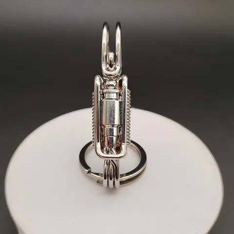 Móc khoa thủ công làm từ inox 304 sợi 2 ly cao cấp 2 cánh đá xanh đỏ